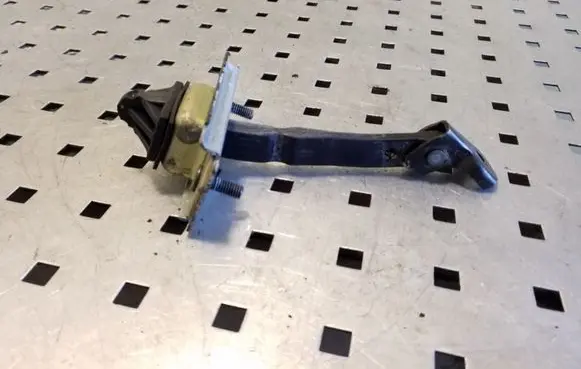 Rear door check strap stopper