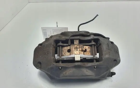 Volkswagen Touareg II Front brake caliper 7P6615105AE