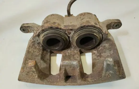 Chrysler Voyager Front brake caliper 68144160AA