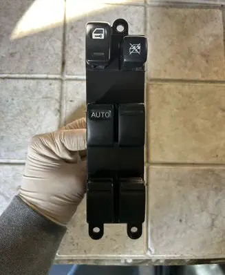 Nissan Almera N16 Electric window control switch 3312