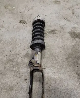 Volkswagen Touareg II Front shock absorber with coil spring 7P6413031