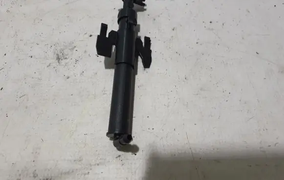 Headlight washer spray nozzle