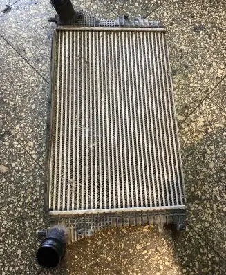 Volkswagen Caddy Intercooler radiator 1K0145803CA