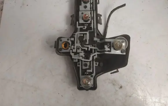 Volkswagen Touran I Tail light bulb cover holder 1T0945258D