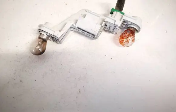 Volvo V50 Tail light bulb cover holder 28127002