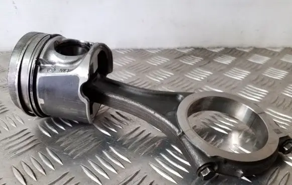 Piston with connecting rod