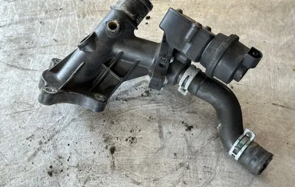 Thermostat/thermostat housing