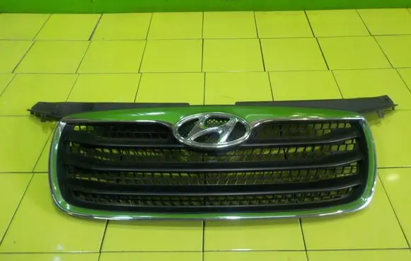 Hyundai Santa Fe Front bumper upper radiator grill 863532B700 13AB1