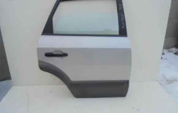 Hyundai Tucson JM Rear door