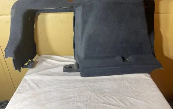 Trunk/boot lower side trim panel