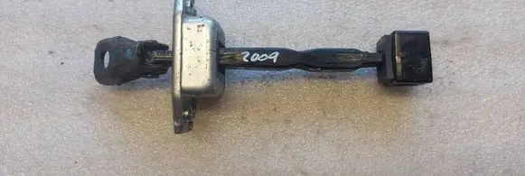 Mitsubishi Outlander Rear door check strap stopper