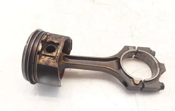 Piston with connecting rod