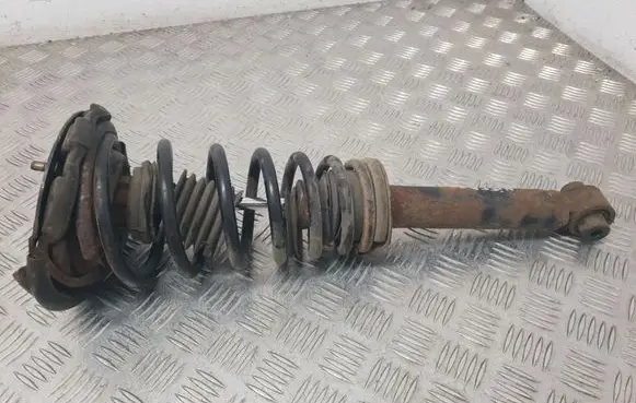 Nissan Primera Front shock absorber with coil spring 561102F000 67026