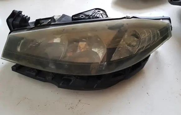 Renault Laguna II Headlight/headlamp 89900470