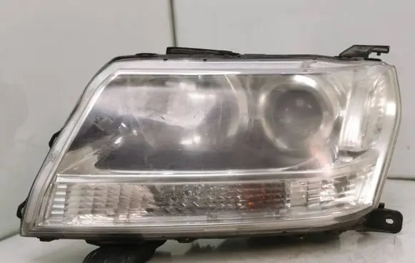 Suzuki Grand Vitara II Headlight/headlamp 10059088 10059079 W3T15971