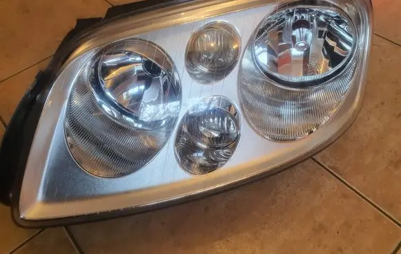 Volkswagen Touran I Headlight/headlamp 0301205201 1T0941005F