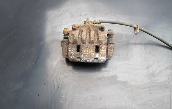 Subaru Impreza IV Front brake caliper