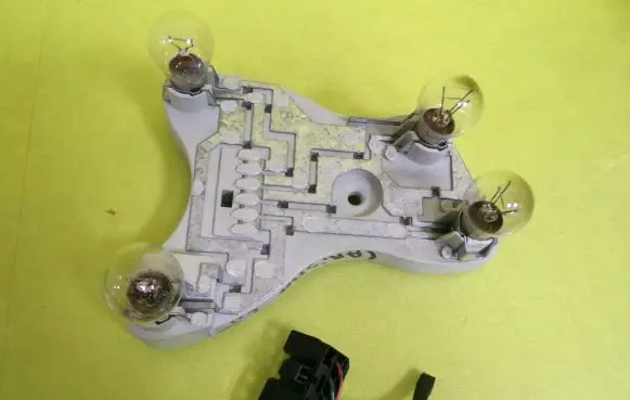 Mitsubishi Carisma Tail light bulb cover holder
