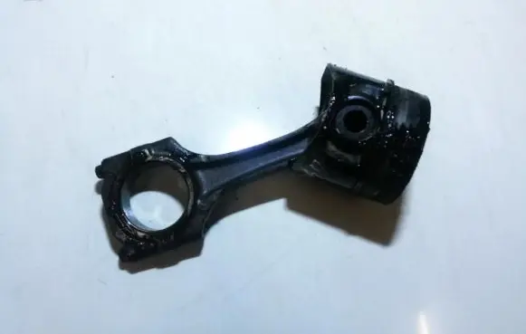 Piston with connecting rod