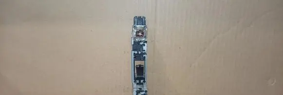 Tail light bulb cover holder