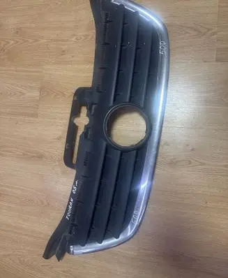 Volkswagen Touran I Front bumper upper radiator grill 1T0853651 1T0853653