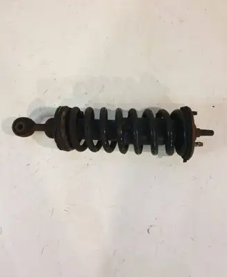 Front shock absorber with coil spring