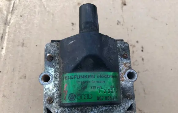 Volkswagen Golf II High voltage ignition coil 867905104A