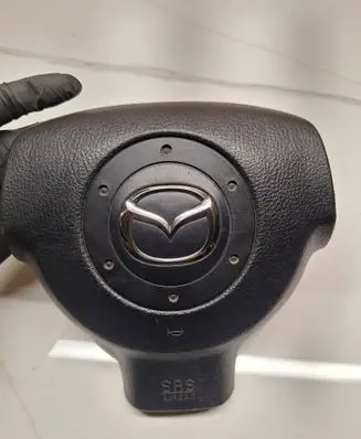 Steering wheel airbag