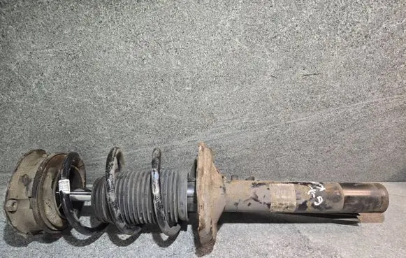Volkswagen Golf VII Front shock absorber/damper 5Q0413023DB