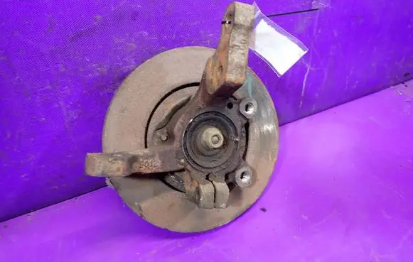 Chrysler LeBaron Front wheel hub spindle knuckle 