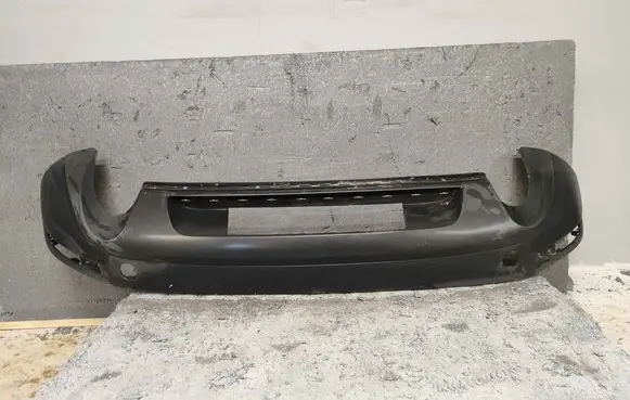 Volkswagen Touareg II Rear bumper lower part trim 7P6807521