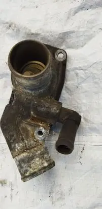 Thermostat/thermostat housing