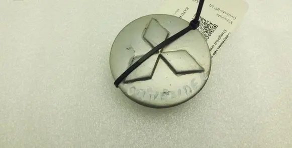 Mitsubishi Outlander Original wheel cap MR554097