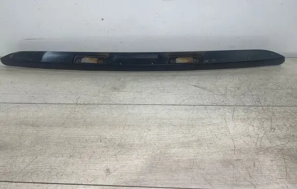 Trunk door license plate light bar