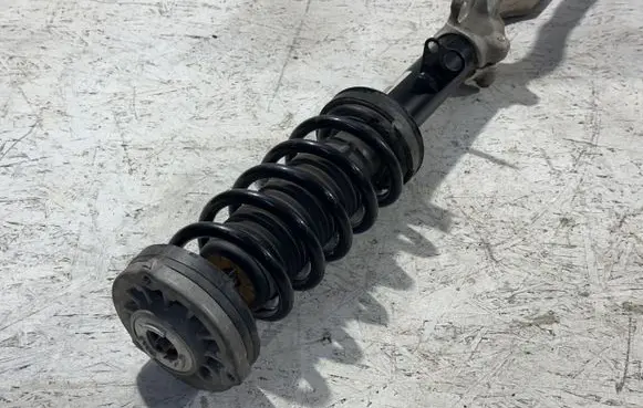 Front shock absorber with coil spring