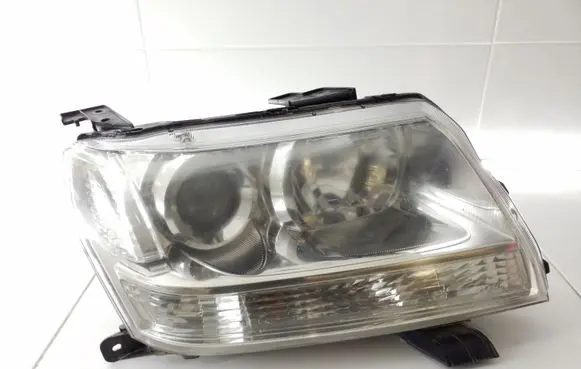 Suzuki Grand Vitara II Headlight/headlamp KOITO10059079