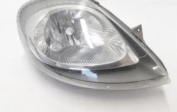 Nissan Primastar Headlight/headlamp 7700311372