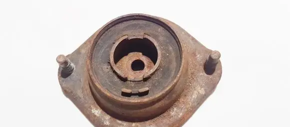 Mazda 121 Coil spring mount 