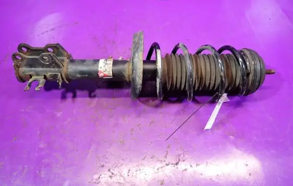 Opel Corsa D Front shock absorber with coil spring 