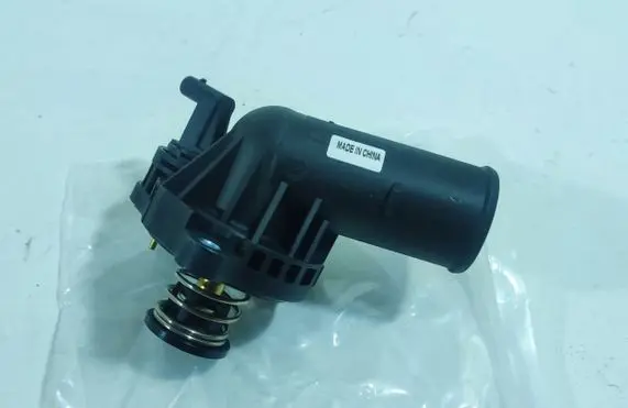 Thermostat/thermostat housing
