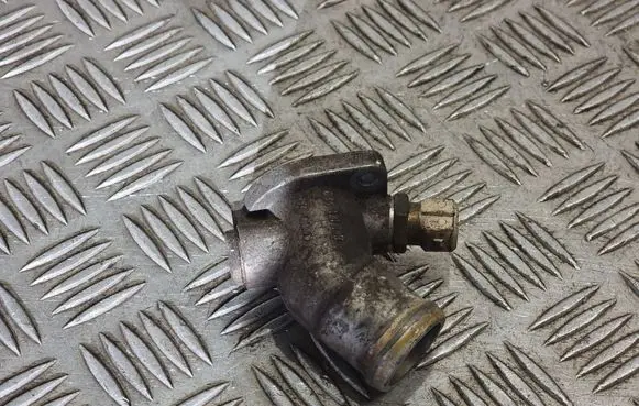 Thermostat/thermostat housing