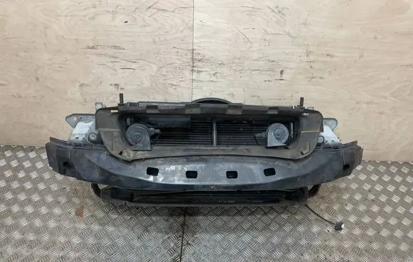 Radiator support slam panel