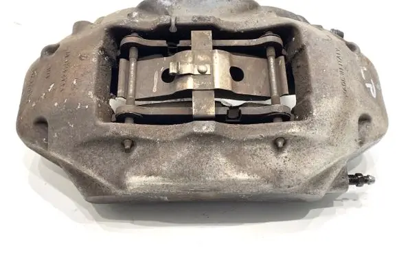 Volkswagen Touareg I Front brake caliper 