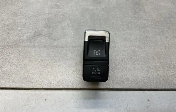 Volkswagen Touareg II Hand parking brake switch 7P2927225A
