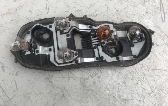 Opel Corsa D Tail light bulb cover holder 89037853