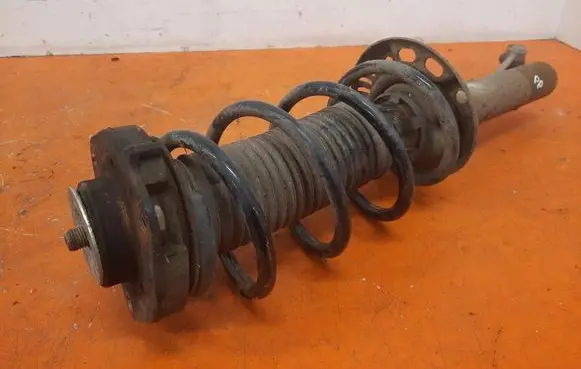 Skoda Octavia Mk2 (1Z) Front shock absorber with coil spring 1K0413031