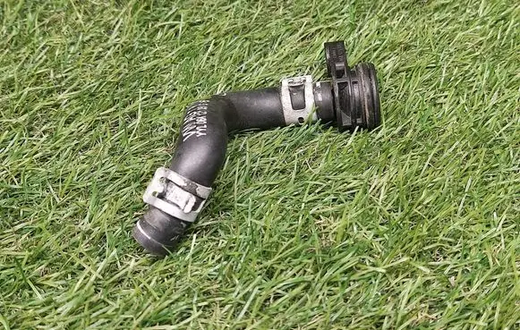 Volkswagen Jetta VI Engine coolant pipe/hose 06K121143