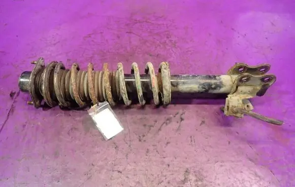 Nissan Micra Front shock absorber with coil spring A18295HL