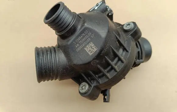 Thermostat/thermostat housing