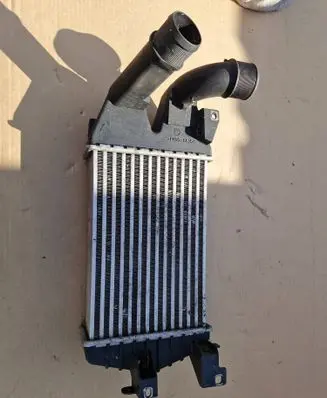 Opel Astra H Intercooler radiator 13218630